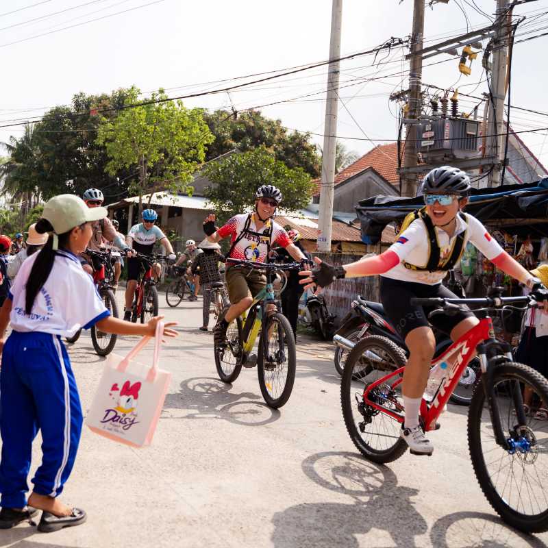 Greeting school students, rural Vietnam