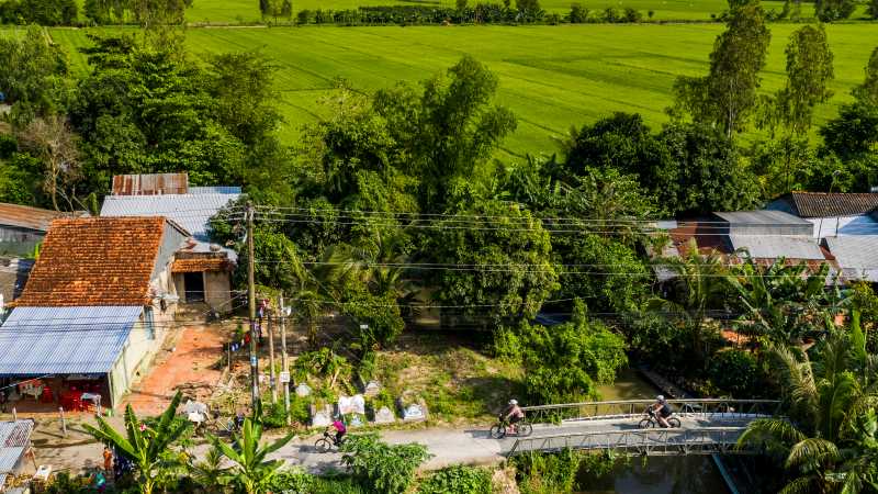 Verdant scenery as we cycle along the Mekong Delta | Lachlan Gardiner