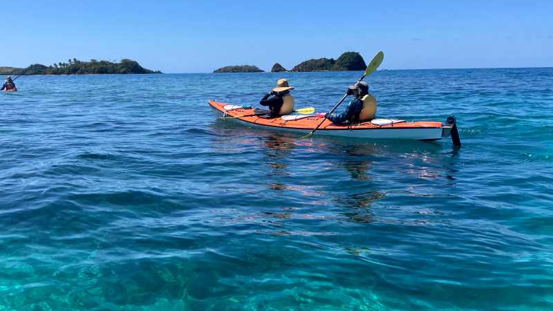Journey between remote islands by sea kayak and experience the Yasawas from the water