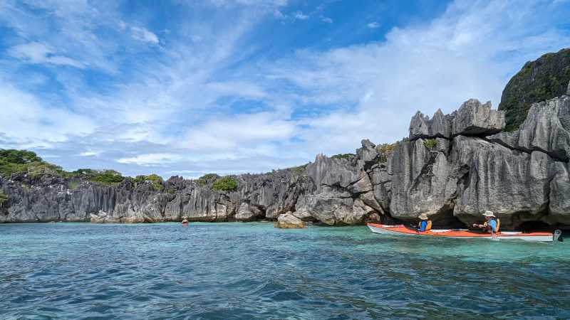 Explore hidden limestone coastlines and quiet island coves accessible only by kayak