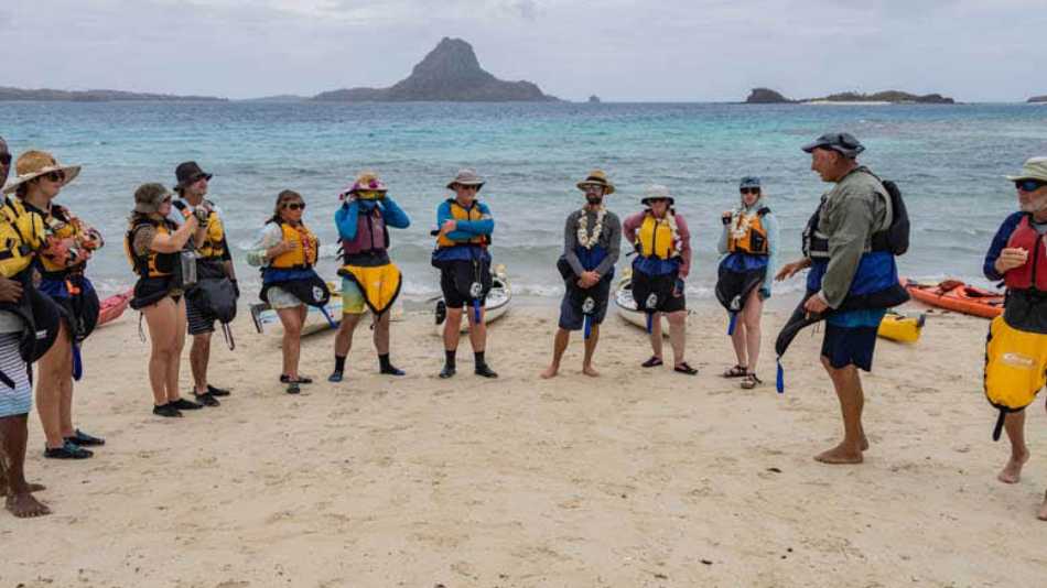 Happy kayakers on our kayak adventure in the Yasawa Islands, Fiji