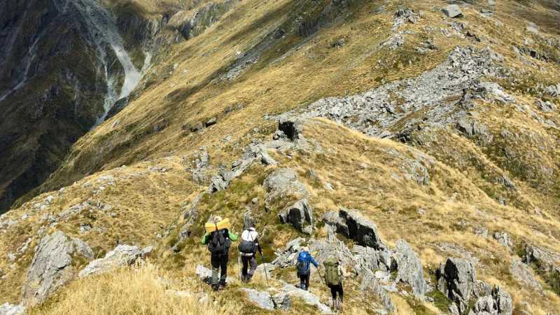 Trekkers on the high alpine trails of Lake Nerine