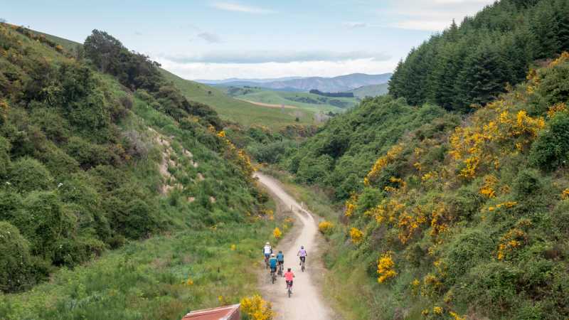 Cyclists riding along the Clutha Gold Trail | Geoff Marks