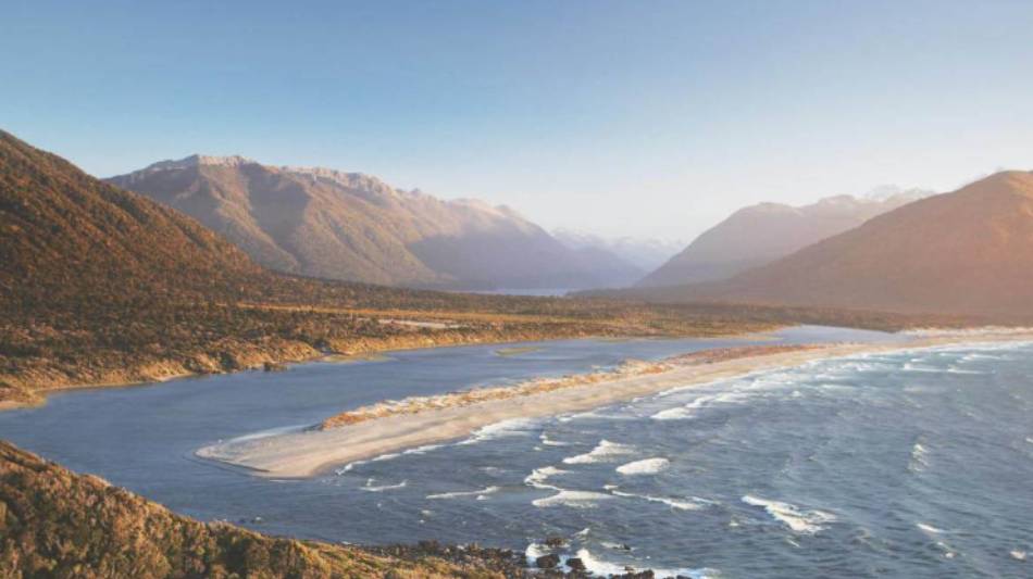Aerial view over Long Reef and Martin's bay on the Fiordland, Hollyford and Stewart Island Trek | Hollyford Track