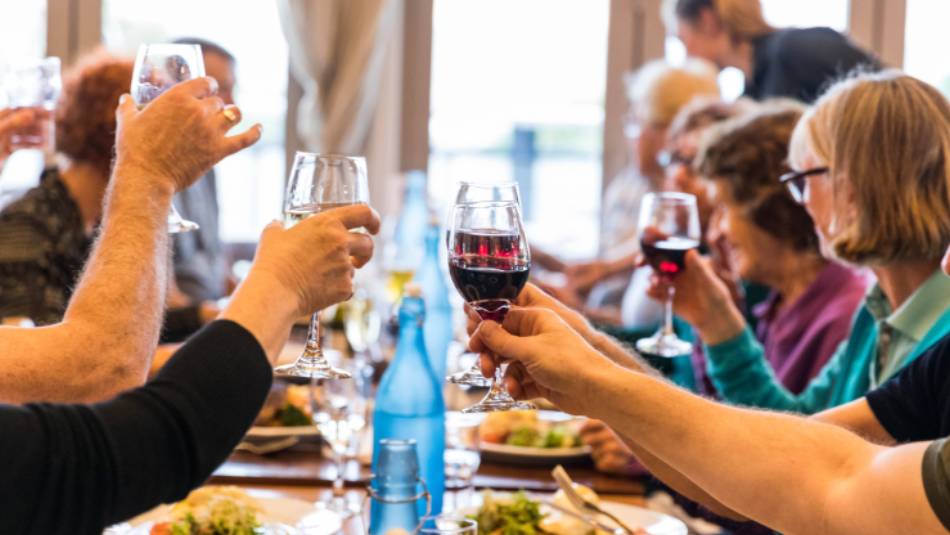 Celebrating with fine food and wine after a good day's ride | Lachlan Gardiner