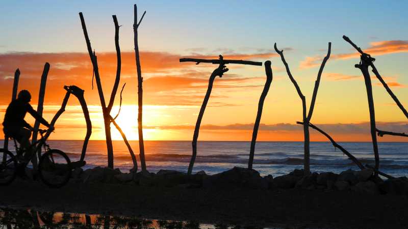 West_Coast_Wilderness_Trail_-_Hokitika_sign_bike_and_sunset_(credit_Craig_Wilson)-original-[72579] (2)