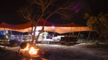The Larapinta campsites offer stylish and comfortable facilities in an outback wilderness