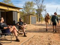 Trekkers relaxing on the porch of their campsites |  <i>Shaana McNaught</i>