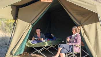 LukeTscharke-Larapinta-20220615-181804-_7R41704,Luke Tscharke Relaxing at our Eco-Comfort Camps on the Larapinta Trail