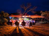 Relaxing around an open fire after a day on the Larapinta Trail |  <i>Caroline Crick</i>