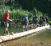 Trekkers crossing the Brown River on Day 5 of the Kokoda Trail -  Photo: Rachael Davis