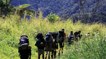 Trekking through the verdant scenery of Papua New Guinea