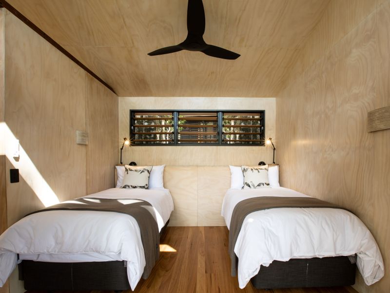 Spicers eco-cabin twin room on the Scenic Rim Trail, Queensland, with timber interior.