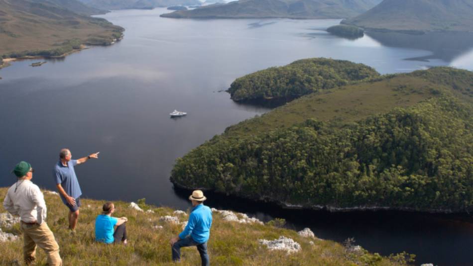 Guide and guests on Balmoral Hill, Port Davey