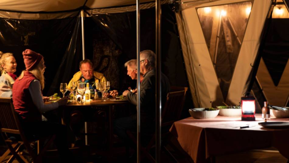 Enjoying dinner at our Eco-Comfort Camp on Flinders Island | Lachlan Gardiner