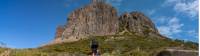 Trekker walking up stairs towards dolerite peak in Walls of Jerusalem National Park |  <i>Benny Plunkett</i>