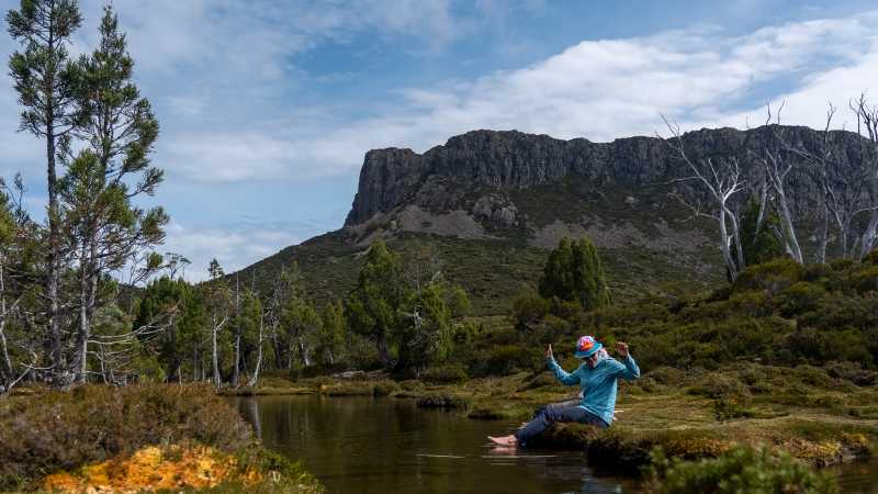 Relaxing by a stream in Walls of Jerusalem National Park. | Benny Plunkett