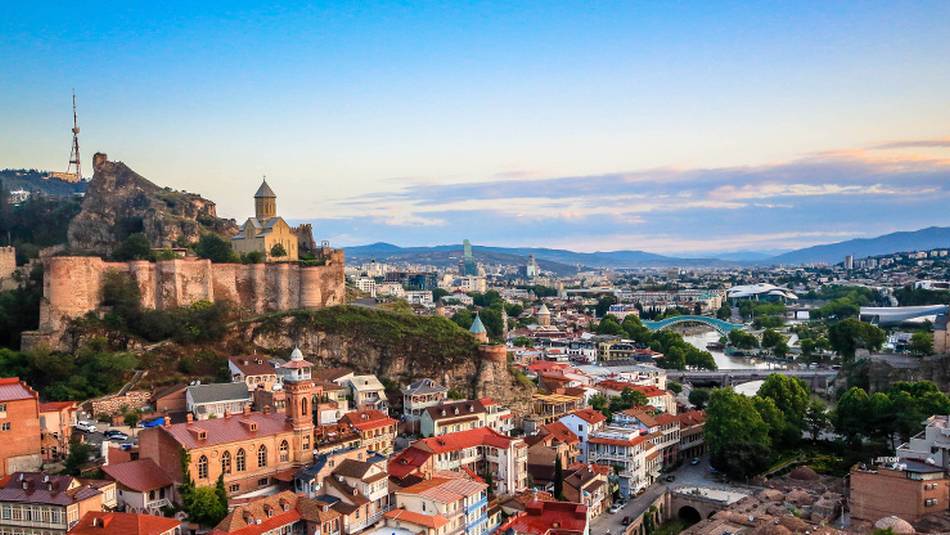 The 17th century Narikala Fortress overlooks the eclectic architecture of Tbilisi's Old Town.