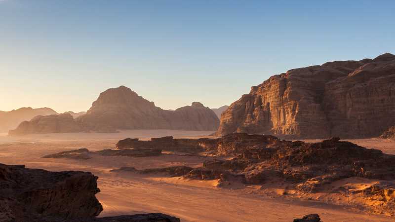 Wadi Rum's desert landscape at sunrise | Richard I'Anson