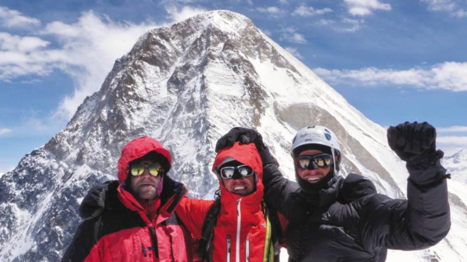 On Chapayev Peak with Khan Tengri in the background | Warren Townsden
