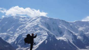 Kyrgyzstan,Ak-Sai Travel Enormous peaks rise above the meadows to met the sky