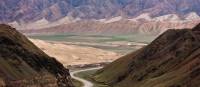 The road between Naryn and Bishkek winds its way through spectacular valleys | Peter Walton