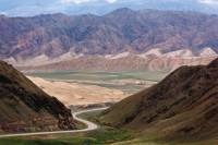 The road between Naryn and Bishkek winds its way through spectacular valleys |  <i>Peter Walton</i>