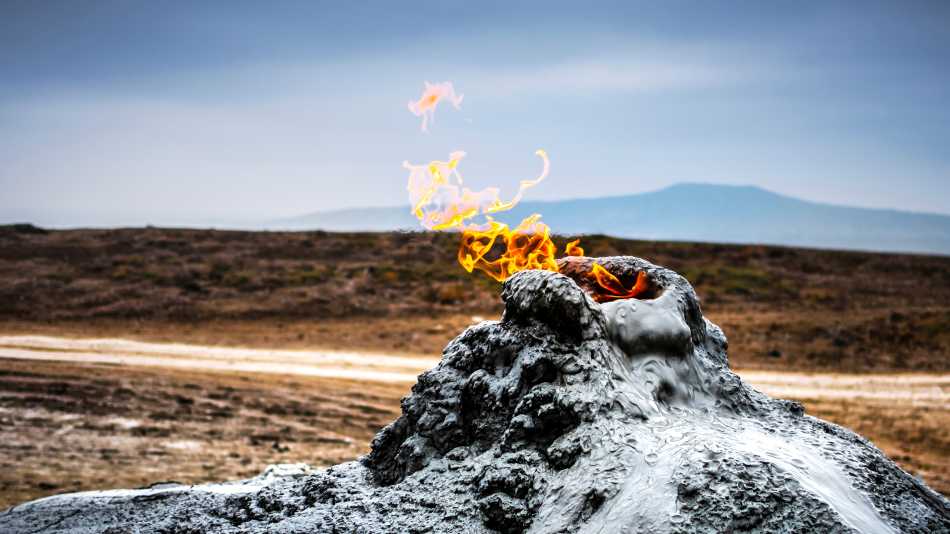 Natural gas burning in one of Gobustan's mud volcanoes