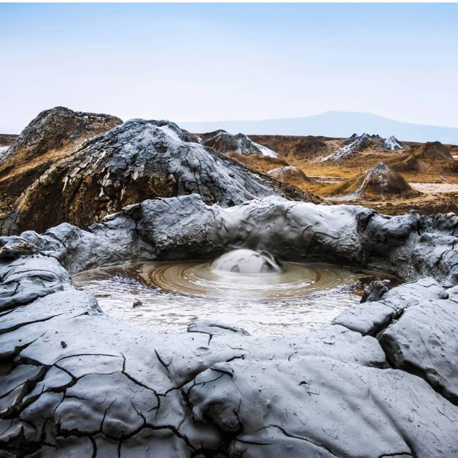 Bizarre bubbling mud volcanoes in Gobustan National Park, Azerbaijan.