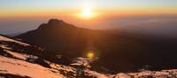 Sun rises over Mawenzi Peak on summit night, revealing the Earth’s curvature | Chloe Ryan