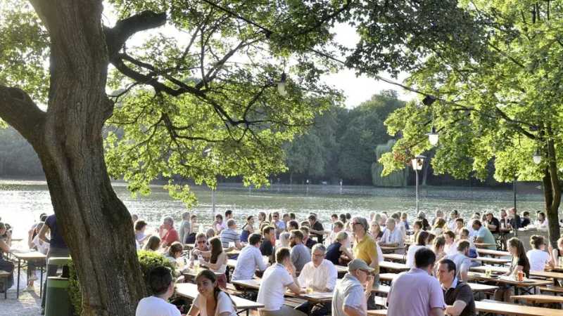Relax by the water at Seehaus Biergarten with a classic Paulaner in hand | Falk Heller