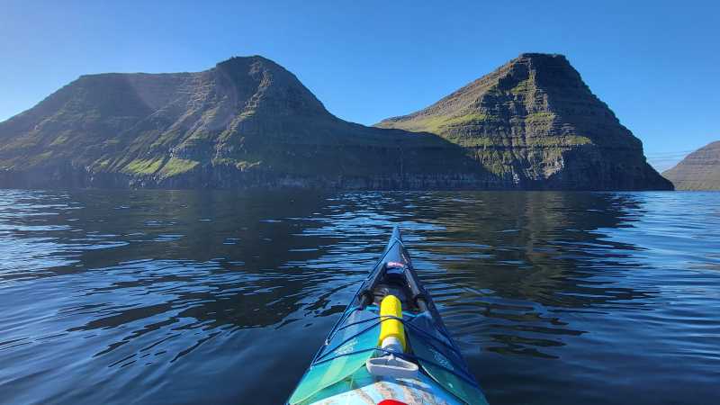 Sea kayaking beneath the mountains of the Faroe Islands - Faroe Islands: Kayaking the North Atlantic, Faroe Islands