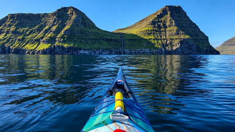 Sea kayaking beneath the dramatic peaks of the Faroe Islands - Faroe Islands: Kayaking the North Atlantic, Faroe Islands