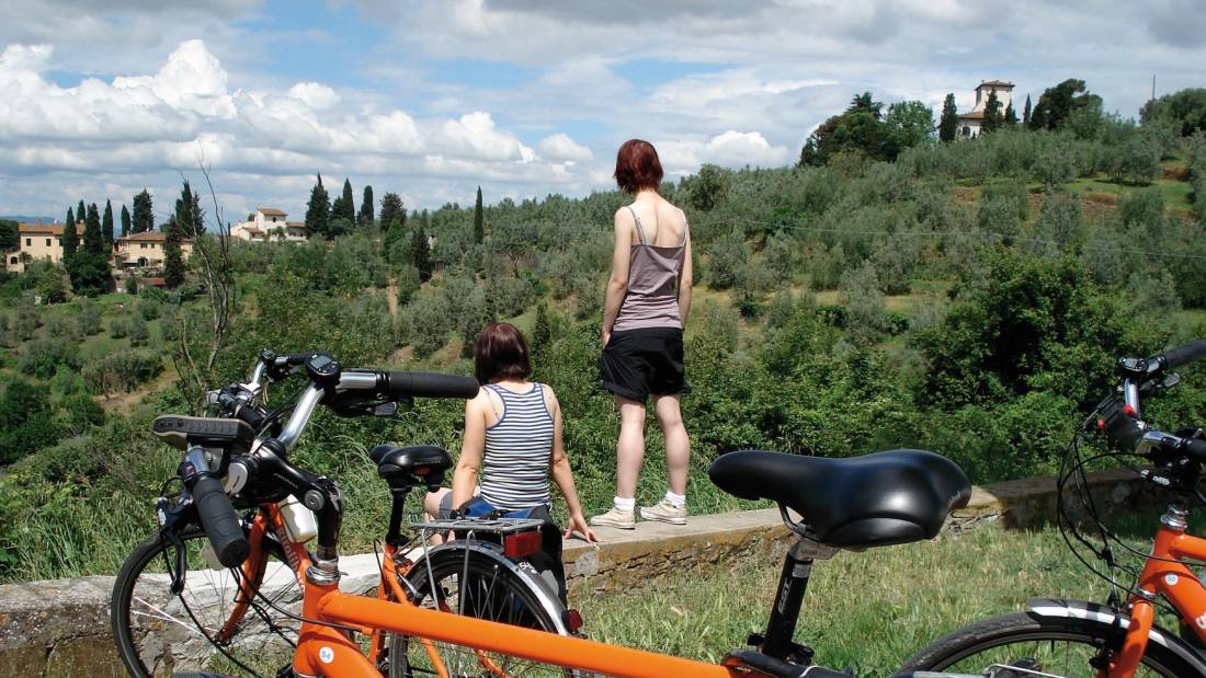 Cyclists taking in the Tuscan view