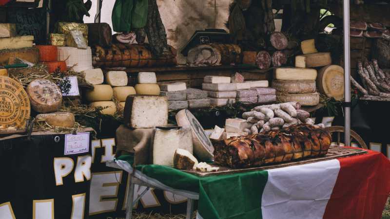 A feast for the senses artisan cheeses, cured meats, and generations of Italian culinary tradition on display. - Savor Italy: Parma to Naples with 2foodtrippers, Italy