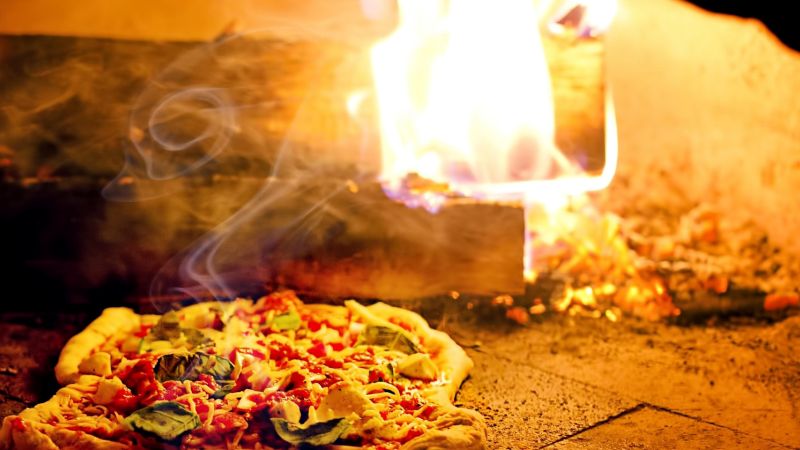 Pizza fresh from the wood-fired oven - Savor Italy: Parma to Naples with 2foodtrippers, Italy