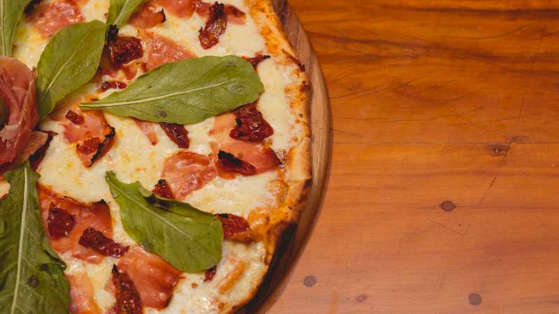 Freshly baked and topped with Italian classics—because every great journey deserves great pizza. - Savor Italy: Parma to Naples with 2foodtrippers, Italy