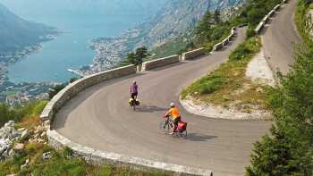 Cruising down the winding roads towards the Bay of Kotor on the Croatia to Albania Coastal Cycle