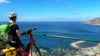 Cyclist taking in the view in Madeira,Eurobike Cyclist taking in the view in Madeira