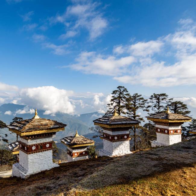 Memorial chortens and panoramic views at Dochu La