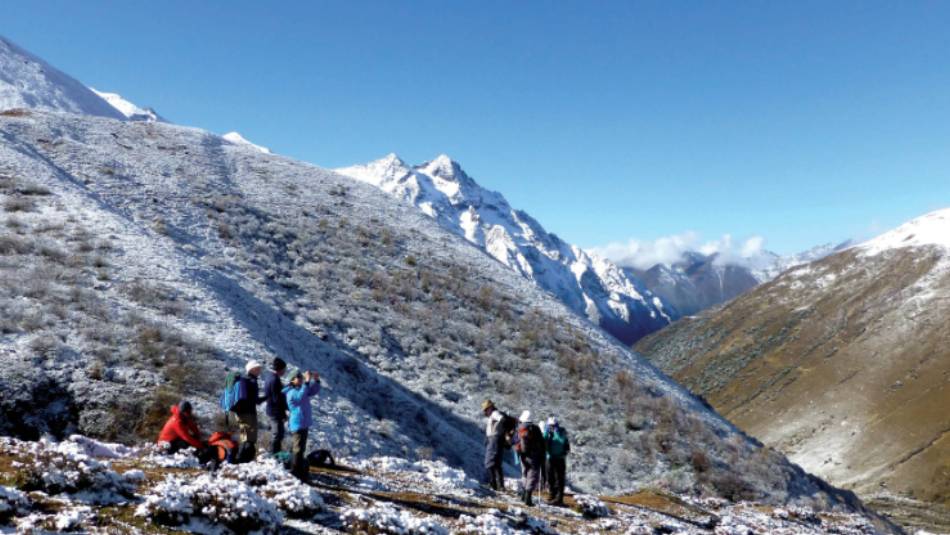Trekkers taking a breather before continuing through to Jangothang | Gavin Turner