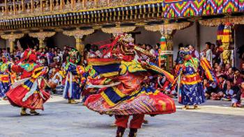 Bhutan's rich ceremonial celebrations include ornate masked dancers
