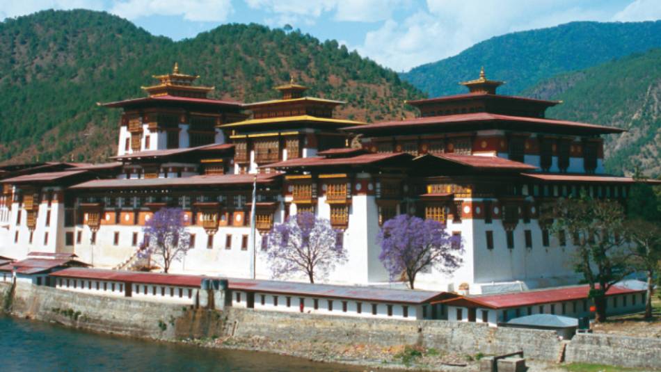 The Punakha Dzong in Western Bhutan is the winter residence of the Central Monk body and a highlight on our Himalayan Kingdoms Explorer. | Julie Anderson