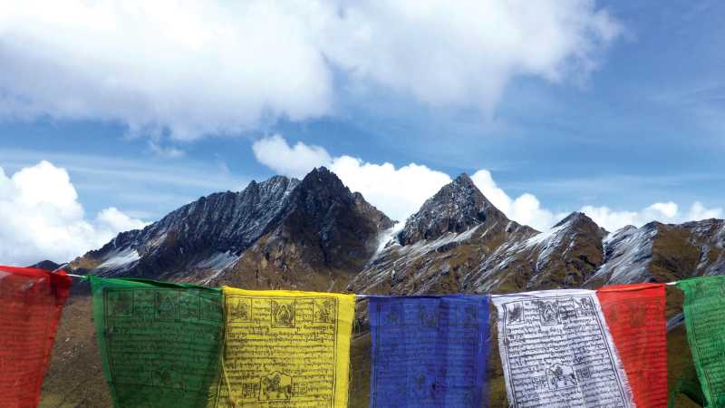 Prayer flags atop a pass in Bhutan | Gavin Turner