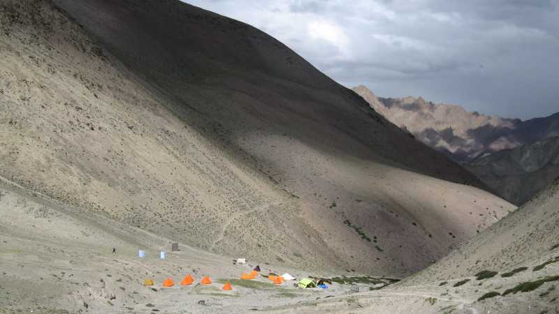 The endless folds of the Zanskar Range and our campsite below the Ganda La - Hidden Valleys of Ladakh, India