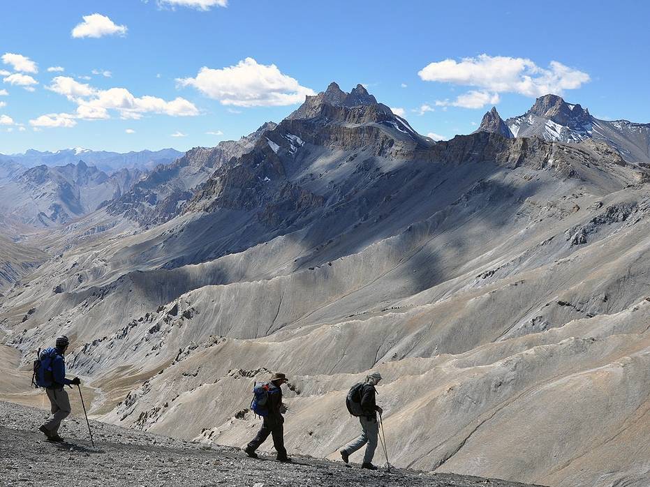 Trekkers make their way over the Zalung La, Ladakh