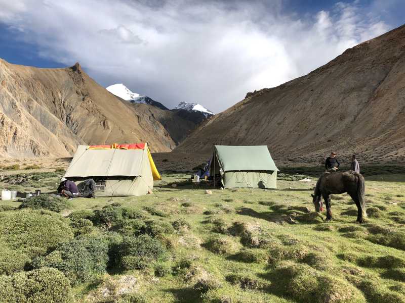 Our camp below the peak of Kangyaze (6400m) on our way to remote Tibetan borderlands | Brad Atwal
