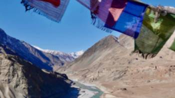 Prayer flags over Zanskar river