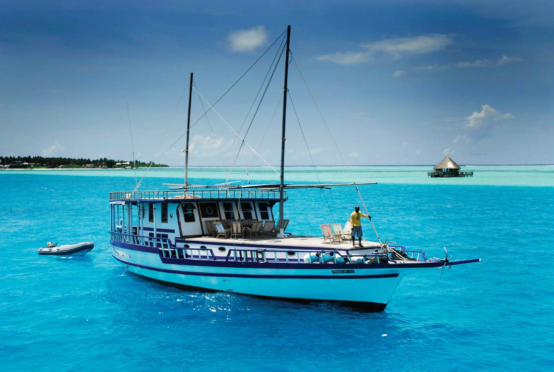 A traditional dhoni cruise is the best way to explore the turquoise waters of the Maldives
