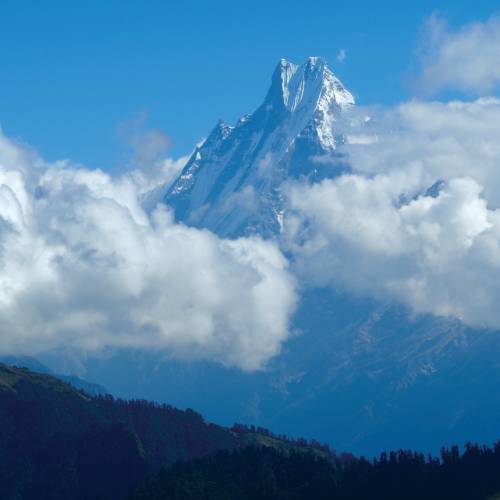Machapuchare peaking through the clouds